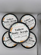 Multiple number of Tallow Body Scrub on a silver surface.