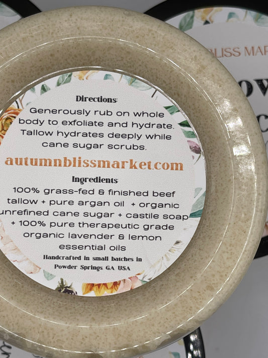 A container of Tallow Body Scrub indicating labelled directions and ingredients.