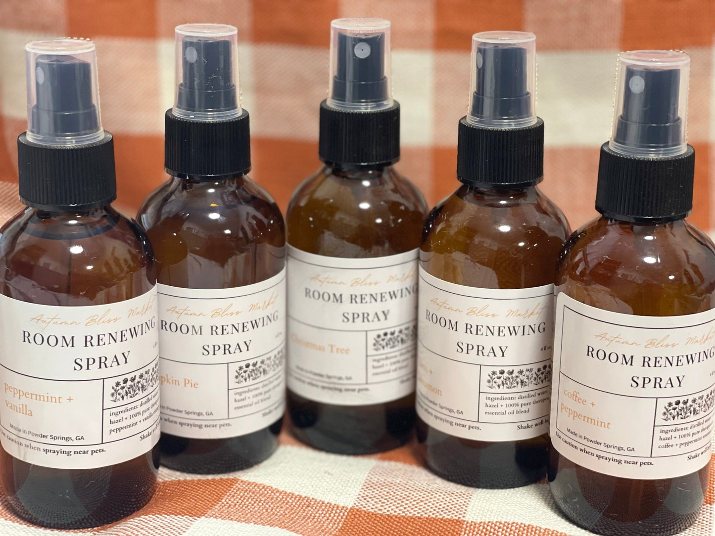 Closely packed bottles of Room Renewing Spray.